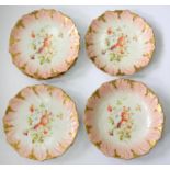 A SET OF EIGHT FRENCH MOULDED PORCELAIN DESSERT SERVICE, PAINTED WITH NATURALISTIC FLOWERS IN A