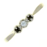 A DIAMOND THREE STONE RING, GOLD HOOP MARKED 18CT PLAT, TWO DIAMONDS DEFICIENT, 2G, SIZE L Centre