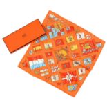 HERMÉS. 'PAVOIS' ORANGE SILK BANDANA SCARF, 46 X 46 CM, BOXED