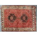 A RUG, 190 X 162CM Some fraying at the edges and corners, hole approximately 8 x 4cm in one corner