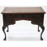 A VICTORIAN CARVED OAK DRESSING TABLE, 76CM H; 107 X 61CM