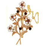 A GARNET AND CULTURED PEARL SPRAY BROOCH IN 9CT GOLD, 53CM L, LONDON 1993, 9.5G One of the