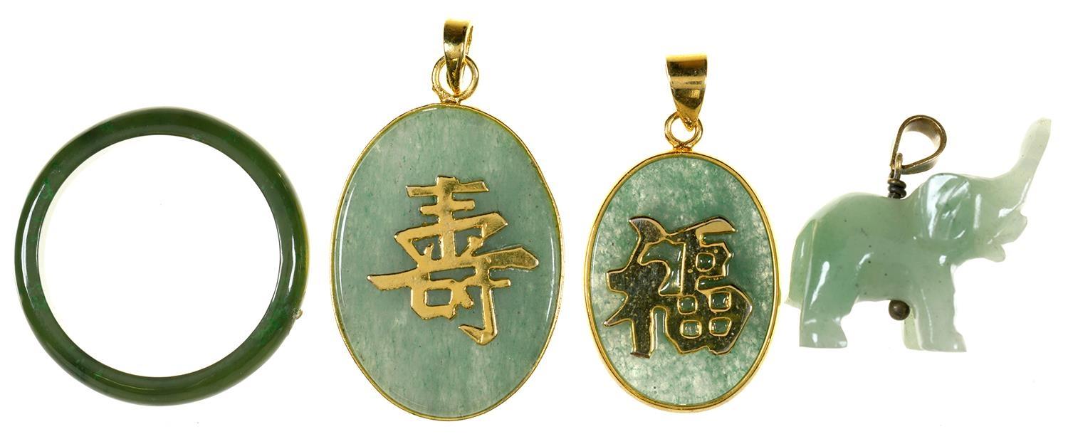 TWO CHINESE GOLD MOUNTED JADE DOUBLE SIDED PENDANTS, A JADE ELEPHANT CHARM AND A NEPHRITE RING - Image 2 of 2