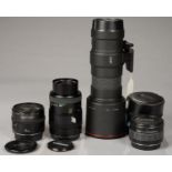 PHOTOGRAPHIC EQUIPMENT. THREE CAMERA LENSES AND A TELECONVERTER, INCLUDING A F5.6 400MM, ETC