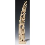 A JAPANESE IVORY OKIMONO OF A MAN AND TWO ONI IN THE BRANCHES OF A TREE, 25CM H, SIGNED KOKO,