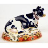 A ROYAL CROWN DERBY FRIESIAN COW 'BUTTERCUP' PAPERWEIGHT, 11CM H, PRINTED MARK, GILT SEAL