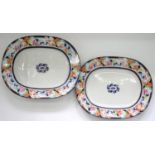 TWO STAFFORDSHIRE EARTHENWARE PAN BORDERED MEAT DISHES, ONE WITH GRAVY TREE AND WELL, 55.5CM L, PUCE