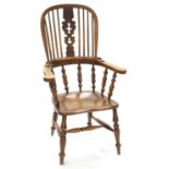 A VICTORIAN ASH HIGH BACK WINDSOR CHAIR WITH ELM SEAT Back rail broken in one place, old repair to