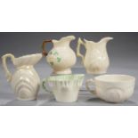 THREE BELLEEK SHAMROCK, LILY AND DOUBLE SHELL CREAM JUGS AND TWO TEACUPS, LARGEST JUG 11CM H,