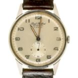 A PAUL BUHRE STAINLESS STEEL GENTLEMAN'S WRISTWATCH, THE BACK ENGRAVED WITH PRESENTATION INSCRIPTION