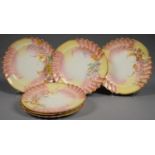 A SET OF SIX ROYAL WORCESTER SHELL MOULDED SHOT ENAMEL DESSERT PLATES, PRINTED AND PAINTED WITH IRIS