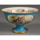 A FRENCH PORCELAIN FOOTED BOWL IN SEVRES STYLE, PAINTED IN BRIGHT ENAMEL WITH FLOWERS, ON THE