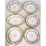 A WEDGWOOD COBALT BORDERED BONE CHINA DESSERT SERVICE, PRINTED AND PAINTED WITH FLOWERS, PLATES 21CM