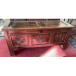 AN EARLY 18TH C CARVED AND PANELLED OAK BLANKET CHEST, 60CM H X 126CM W