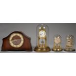 THREE BRASS ANNIVERSARY TIMEPIECES, EARLY 20TH C AND LATER AND A MID 20TH CENTURY WALNUT MANTEL