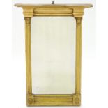 A REGENCY GILTWOOD AND COMPOSITION PIER MIRROR WITH PILASTERS, 80CM H X 56CM W