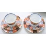 A PAIR OF WEDGWOOD JAPAN PATTERN BONE CHINA BREAKFAST CUPS AND SAUCERS AND SIDE PLATES, PLATES 19.