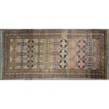 A RUG, 238 X 113CM Heavily worn in places