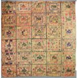 A COLOURFUL INDIAN APPLIQUE-EMBROIDERED COVERLET, FORMED OF THIRTY (5 X 6) BORDERED SQUARES, EACH