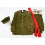 UNIFORM. A BRITISH ARMY LIEUTENANT'S TUNIC BY MICHAEL JAY, STOWMARKET, A PAIR OF TROUSERS AND A