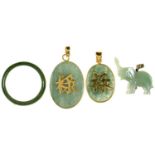 TWO CHINESE GOLD MOUNTED JADE DOUBLE SIDED PENDANTS, A JADE ELEPHANT CHARM AND A NEPHRITE RING