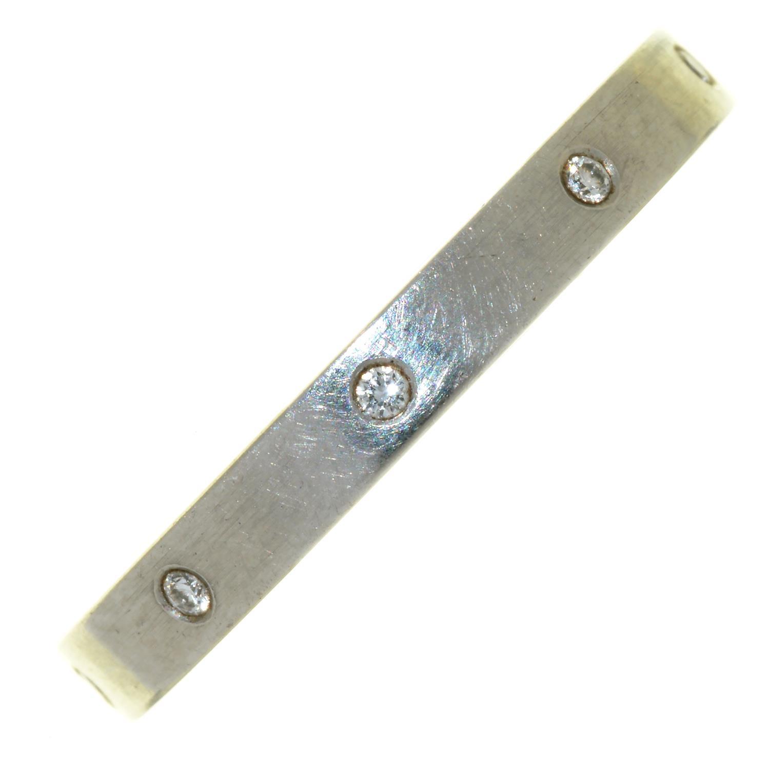 A DIAMOND ETERNITY RING, IN PLATINUM, MARKED 950 AND 0.09 F, VS, 6.8G, SIZE L½ Good condition, metal