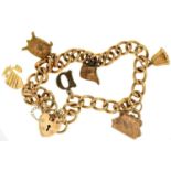 A 9CT GOLD CHARM BRACELET, 10.2G Good condition, charm of Chinese junk marked 14k 585, turtle marked