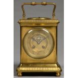 A FRENCH BRASS CARRIAGE CLOCK, THE DIAL WITH VISIBLE ESCAPEMENT, BLUED STEEL HANDS AND INSCRIBED
