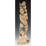 A JAPANESE IVORY OKIMONO OF A FARMER WITH A BASKET OF EGGS AND CARRYING HIS SMALL SON ON HIS