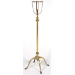 AN ARTS AND CRAFTS TELESCOPIC BRASS OIL LAMP DESIGNED AND MANUFACTURED BY W. A. S. BENSON, ON FOUR