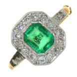 AN EMERALD AND DIAMOND CLUSTER RING WITH DIAMOND SHOULDERS, GOLD HOOP, INDISTINCTLY MARKED, 2G, SIZE