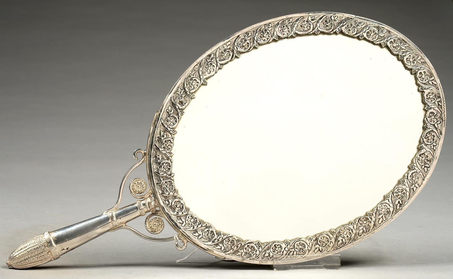 AN OTTOMAN SILVER HAND MIRROR, CHASED IN HIGH RELIEF WITH ROSES AND OTHER FLOWERS FRAMED BY - Image 2 of 3
