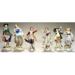 THREE PAIRS OF SITZENDORF FIGURES, COMPRISING A LADY AND GALLANT, DANCERS OR RUSTICS CARRYING A