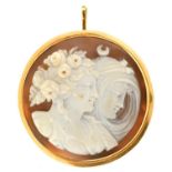 A 19TH C CAMEO BROOCH - PENDANT, THE ROUND SHELL CARVED WITH DAY AND NIGHT, AFTER THORWALDSEN,  IN