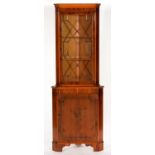 A REPRODUCTION YEW WOOD CORNER CABINET, 182CM H; 65 X 40CM Some minor scuffs and dents to edge of