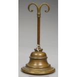 A VICTORIAN BRASS DOOR STOP, IRON-WEIGHTED, 25CM H Good condition