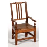 A 19TH C FRUITWOOD CHILD'S ARMCHAIR, SOLID SEAT, 41CM W Small splits on both arms, otherwise good,