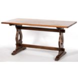 AN ANTIQUE STYLE OAK DINING TABLE ON TRESTLE ENDS WITH PEGGED STRETCHER, 75CM H; 152 X 75CM Slightly