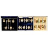 A HARLEQUIN SET OF SIX NORWEGIAN SILVER GILT AND GUILLOCHE ENAMEL COFFEE SPOONS, A  SET OF SIX