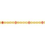 A GOLD BRACELET WITH RUBY CABOCHONS AT INTERVALS, APPROXIMATELY 160MM, MARKED 375, 12.8G Good