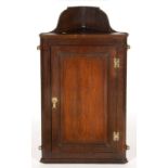 A GEORGE III OAK CORNER CUPBOARD WITH RAISED AND FIELDED PANEL TO THE DOOR, 102CM H; 58 X 30CM Small