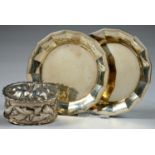 A GERMAN OVAL SILVER REPOUSSE BOX AND COVER, DECORATED IN HIGH RELIEF WITH LILES, IN CRIMPED RIM,