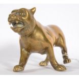 AN INDIAN BRASS MODEL OF A TIGER, 14CM L, EARLY 20TH C Old metal polish residue