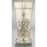 A GERMAN SILVER BEAKER SHAPED VASE, EMBOSSED WITH  MERMAIDS AND DOLPHINS, 28CM H, BY LUDWIG
