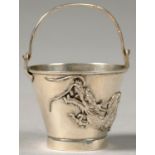 A CHINESE MINIATURE SILVER PAIL, CHASED AND APPLIED WITH A DRAGON, BAMBOO FORM SWING HANDLE, 8.5CM H
