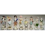 FOUR PAIRS OF SITZENDORF FIGURES OF A LADY AND GALLANT AS GARDENERS OR DANCERS, 18CM H AND CIRCA,