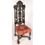 A WILLIAM III CARVED AND STAINED CHAIR, LATE 17TH C AND LATER Centre splat damaged and repaired