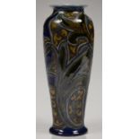 AN ART NOUVEAU DOULTON WARE VASE WITH PIGMENT BRUSH - LINE DECORATION OR STYLISED FOLIAGE BY MARK V.