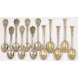AN UNUSUAL SET OF FIVE VICTORIAN SILVER COFFEE SPOONS, ORNATE ONSLOW SHAPE, THE SHELL BOWL CENTRED