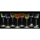 A SET OF EIGHT BACCARAT HARLEQUIN CASED AND CUT HOCK GLASSES, ON CLEAR STEM AND FOOT, 19CM H FOOT OF